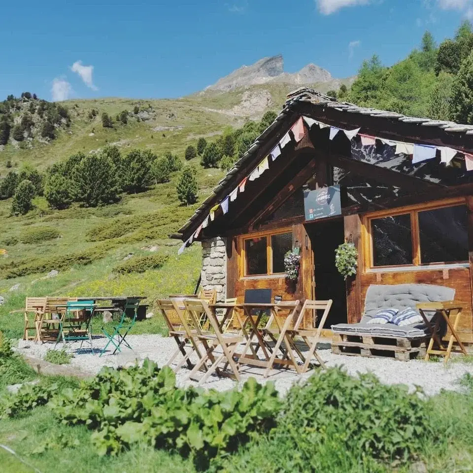 The terrace of La Chotte, a high-altitude bar above Arolla, facing the peaks